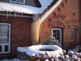 Foto Gebäudefront mit Schnee